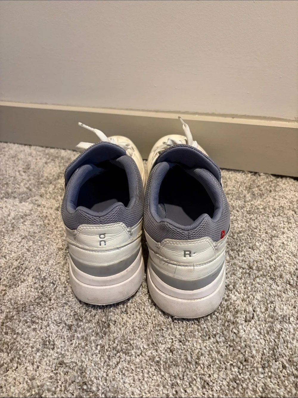 On Running “Roger” Sneaker. White and grey. Mens size 10.5. Used.